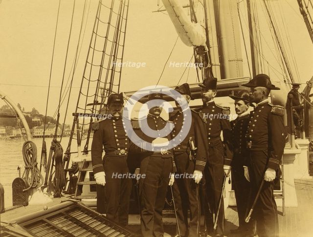 Six naval officers, full-length portrait, standing on deck of ship, 1894 or 1895. Creator: Alfred Lee Broadbent.