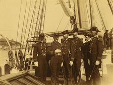 Six naval officers, full-length portrait, standing on deck of ship, 1894 or 1895. Creator: Alfred Lee Broadbent