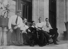 Six Cleveland ball players seated on porch, 1910. Creator: Bain News Service
