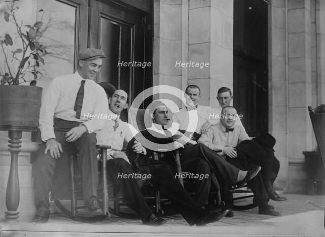 Six Cleveland ball players seated on porch, 1910. Creator: Bain News Service.