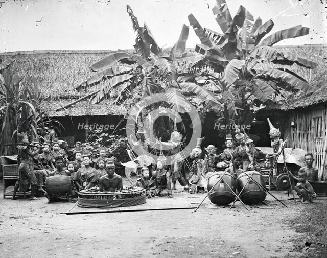 Siam (Thailand): a khon (masked dance drama) and lakhon (acting) troupe, 1865. Creator: John Thomson.