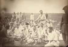 Siberian convicts taking lunch by the roadside (common criminals), between 1885 and 1886. Creator: Unknown