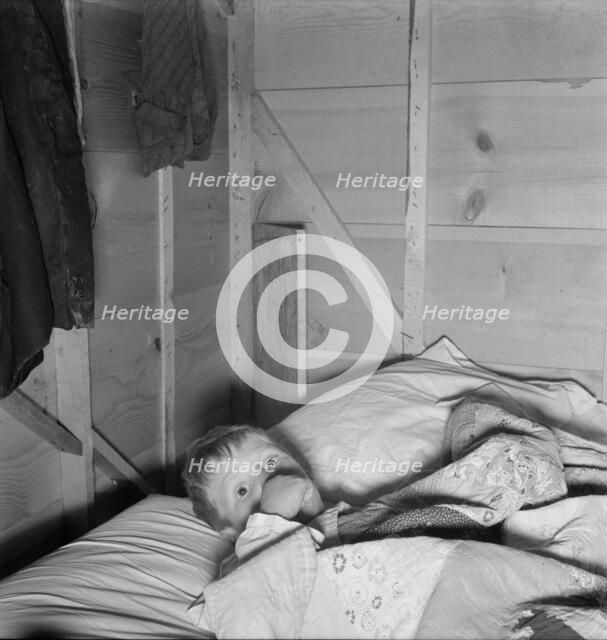 Sick child, Merrill, Klamath County, Oregon, 1939. Creator: Dorothea Lange.