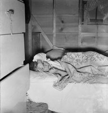 Sick child of young couple who migrated to Oregon..., Merrill, Klamath County, Oregon, 1939. Creator: Dorothea Lange