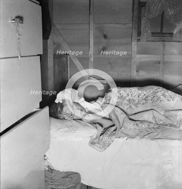 Sick child of young couple who migrated to Oregon..., Merrill, Klamath County, Oregon, 1939. Creator: Dorothea Lange.