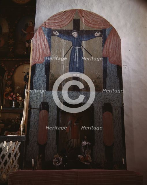 Side altar in the church dedicated to San Lorenzo and San Felipe de Jesus, Trampas, New Mexico, 1943 Creator: John Collier.
