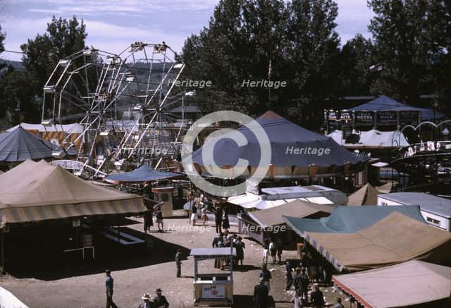 Side shows at the Vermont state fair, Rutland, 1941. Creator: Jack Delano.