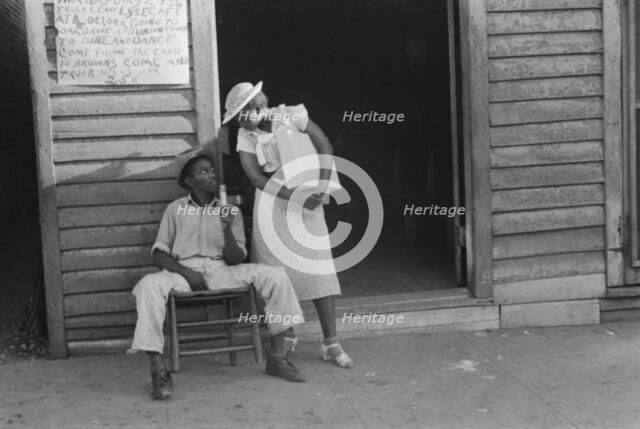 Sidewalk scene, Alabama, 1936. Creator: Walker Evans.