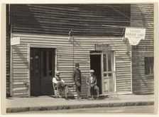 Sidewalk Portrait of Three Men, Vicksburg, Mississippi, 1936. Creator: Walker Evans