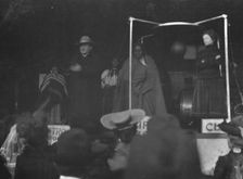 Sidewalk performance or carnival performance, Cliff Dwellers, between 1896 and 1911. Creator: Arnold Genthe