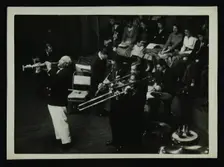 Sidney Bechet (soprano saxophone) in concert at Colston Hall, Bristol, 1956. Creator: Denis Williams