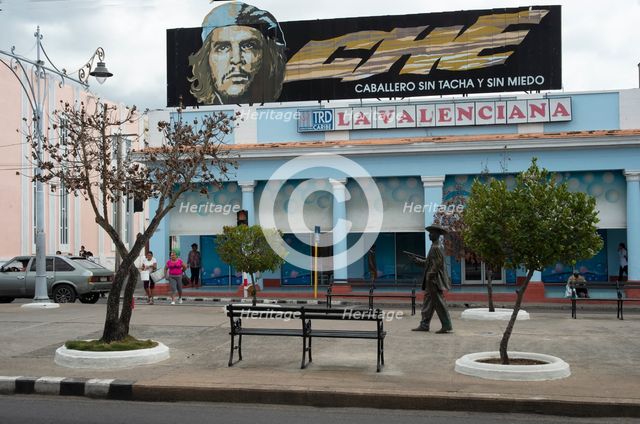 Sign 'advertising' the bravery of Che Guevara overlooking the pedestrian area, Cienfuegos, Cuba,2024 Creator: Ethel Davies.