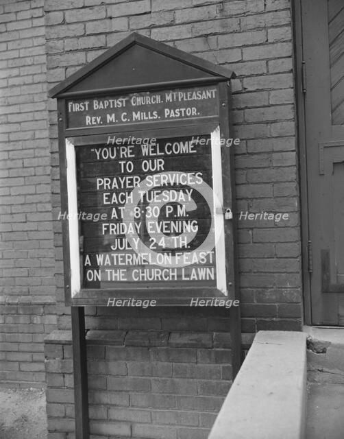 Sign in front of a church, Washington, D.C., 1942. Creator: Gordon Parks.
