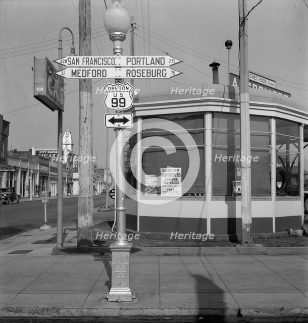 Sign of service station, U.S. 99, Josephine County, Oregon, 1939. Creator: Dorothea Lange.