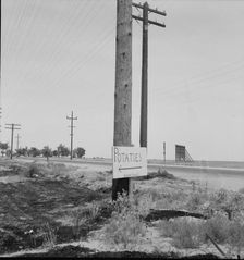 Sign on USHighway 99 near Shafter, California, 1937. Creator: Dorothea Lange
