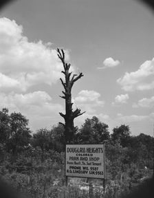 Sign on Alabama Avenue, Frederick Douglass housing project, Anacostia, D.C (vicinity), 1942. Creator: Gordon Parks