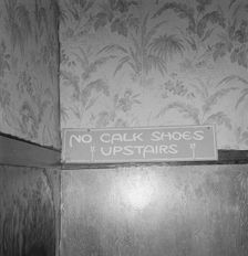 Sign on staircase on Brooks Hotel in a town..., West Carlton, Yamhill County, Oregon, 1939. Creator: Dorothea Lange