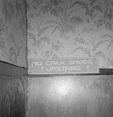 Sign on staircase on Brooks Hotel in a town..., West Carlton, Yamhill County, Oregon, 1939. Creator: Dorothea Lange