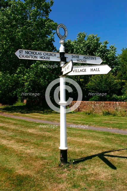 Signpost pointing to Jane Austen's House, Chawton, Hampshire. Creator: Peter Thompson.