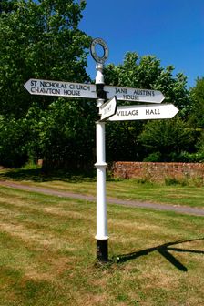 Signpost pointing to Jane Austen's House, Chawton, Hampshire. Creator: Peter Thompson