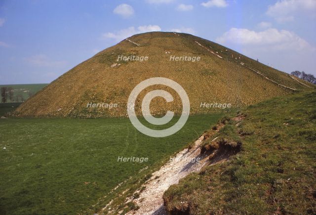 Silbury Hill, Wiltshire from the West, 20th century. Artist: CM Dixon.