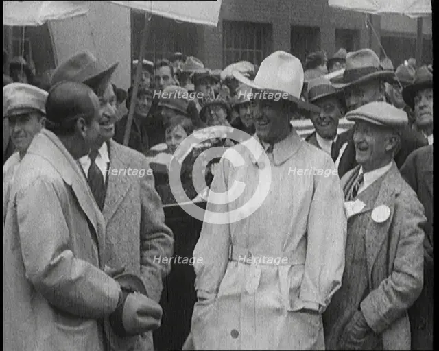 Silent Movie Stars Douglas Fairbanks, Will Rogers, and Tom Mix Posing for the Camera With..., 1921. Creator: British Pathe Ltd.