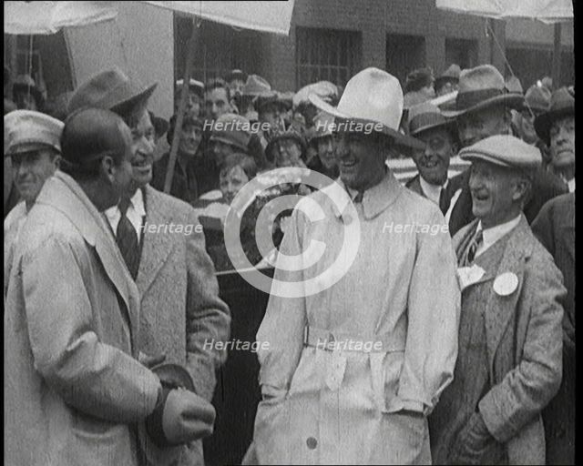 Silent Movie Stars Douglas Fairbanks, Will Rogers, and Tom Mix Posing for the Camera With..., 1921. Creator: British Pathe Ltd.