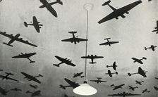 Silhouettes of military aircraft...at an RAF training school during the Second World War, 1941. Creator: Charles Brown