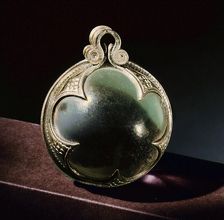 Silver-mounted rock-crystal sphere, a pendant from a necklace
