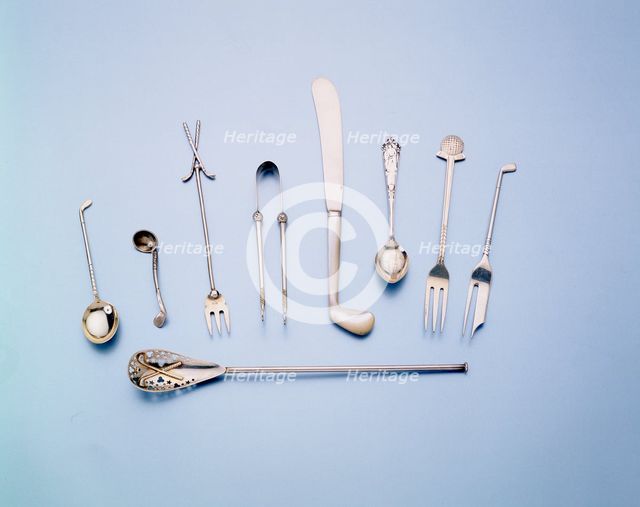 Silver and mother-of-pearl cutlery with a golfing theme, 1920s. Creator: Unknown.
