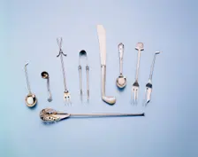 Silver and mother-of-pearl cutlery with a golfing theme, 1920s. Creator: Unknown