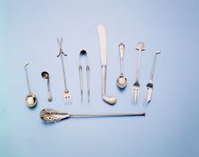 Silver and mother-of-pearl cutlery with a golfing theme, 1920s. Creator: Unknown