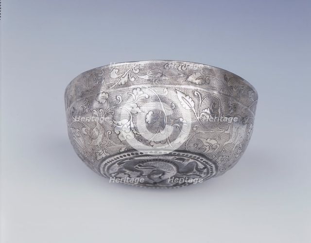 Silver bowl with animals, birds and dragon, High Tang period, China, 8th century. Artist: Unknown