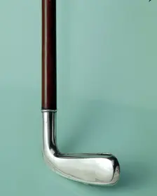 Silver cigarette case walking stick designed to look like a golf club, c1910. Creator: Unknown