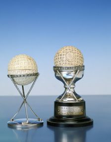 Silver hole-in-one trophies for 1924 and 1930s. Creator: Unknown