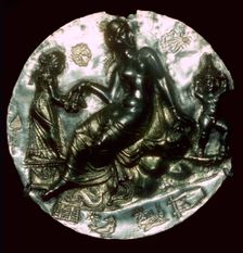 Silver relief medallion bearing the image of Aphrodite and Eros