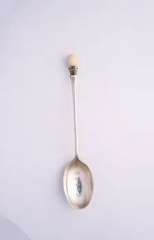 Silver spoon with golf ball motif, c1910. Creator: Unknown