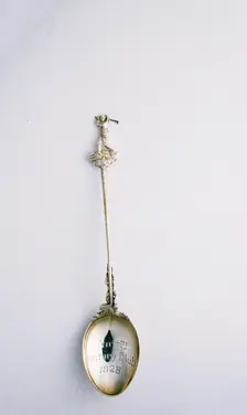 Silver spoon with golfer motif, British, c1910-c1930. Creator: Unknown