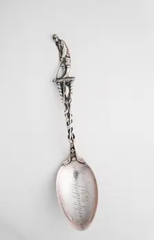 Silver spoon with golfer, c1910-c1937. Creator: Unknown