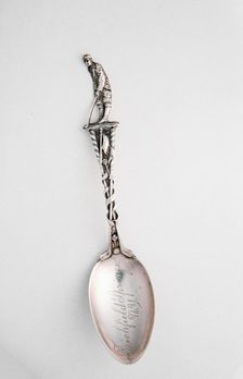 Silver spoon with golfer, c1910-c1937. Creator: Unknown