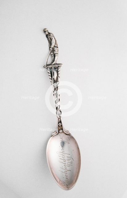 Silver spoon with golfer, c1910-c1937. Creator: Unknown.