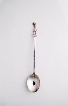 Silver spoon with golfing theme, c1910. Creator: Unknown