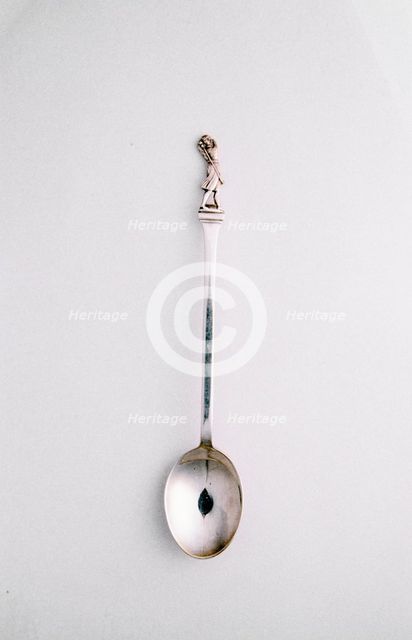 Silver spoon with golfing theme, c1910. Creator: Unknown.