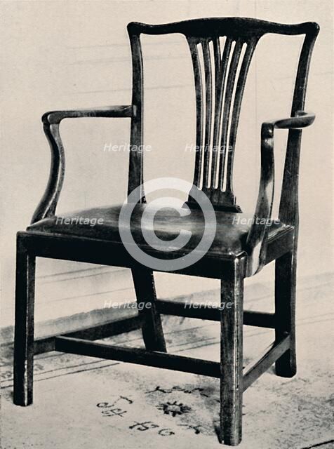 'Simple Chippendale Mahogany Arm-Chair with Rail Back and Movable Seat', mid 18th century, (1927) . Artists: Edward F Strange, Thomas Chippendale.