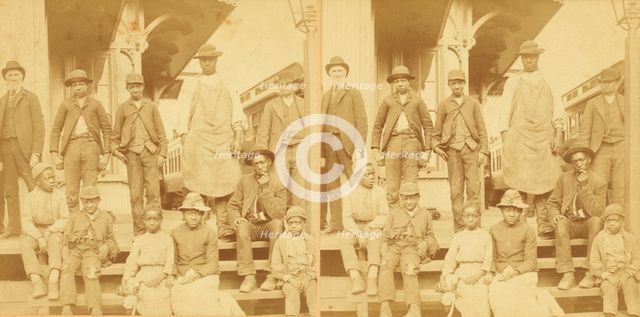 Simplicity, Alabama, U.S.A. [Group gathered on a porch, in town], (1868-1900?). Creator: Benjamin West Kilburn.