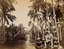 Singapore: a western hunter and native Malays with a background view of the Roman Catholic..., 1880. Creator: John Edmund Taylor