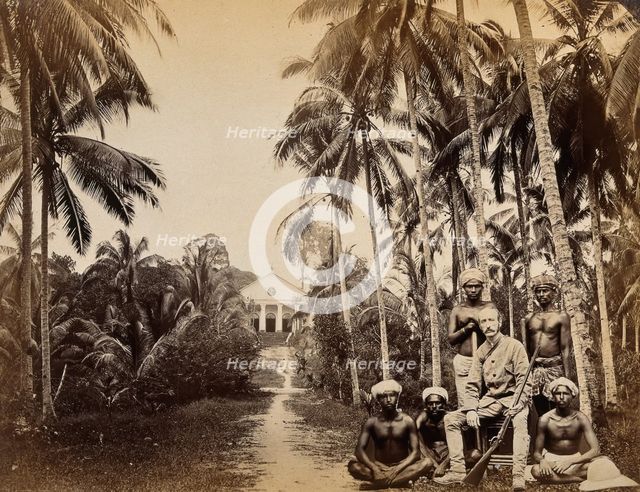 Singapore: a western hunter and native Malays with a background view of the Roman Catholic..., 1880. Creator: John Edmund Taylor.