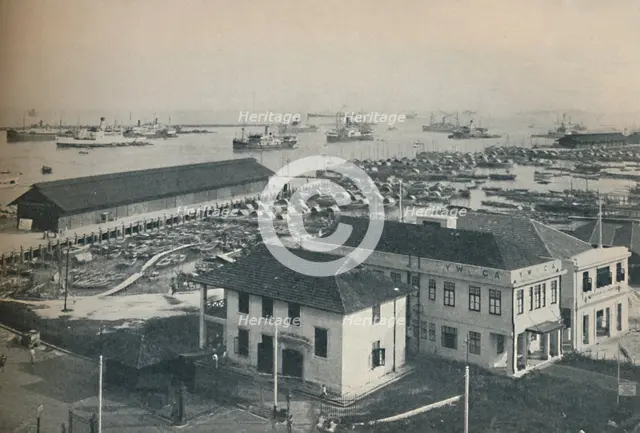 'Singapore Harbour is always crowded with shipping of many type and nationalities', 1937. Artist: Unknown.