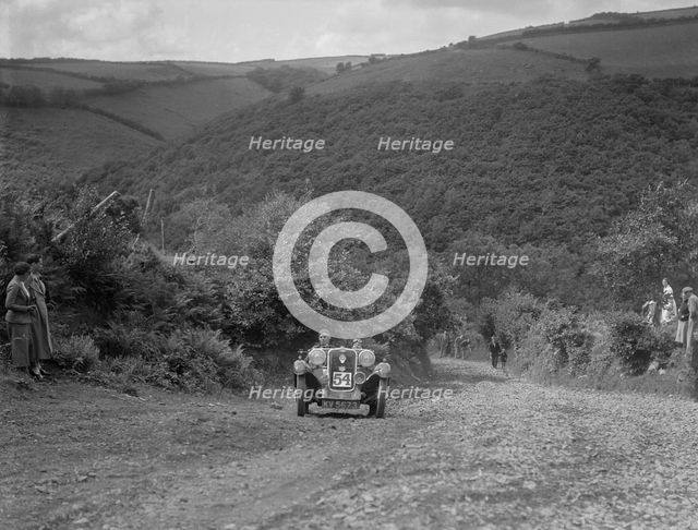 Singer 2-seater competing in the Mid Surrey AC Barnstaple Trial, Beggars Roost, Devon, 1934. Artist: Bill Brunell.