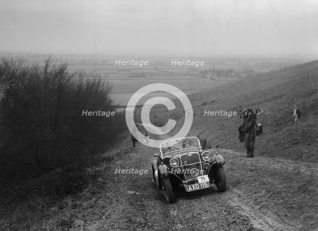 Singer 2-seater sports competing in a trial, Crowell Hill, Chinnor, Oxfordshire, 1930s. Artist: Bill Brunell.